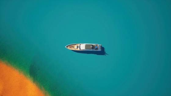 A boat floating in clear turquoise water beside a quiet shoreline